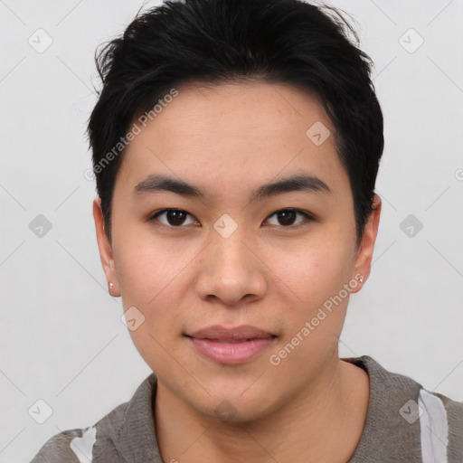 Joyful asian young-adult female with short  black hair and brown eyes