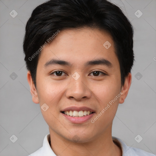 Joyful asian young-adult male with short  black hair and brown eyes