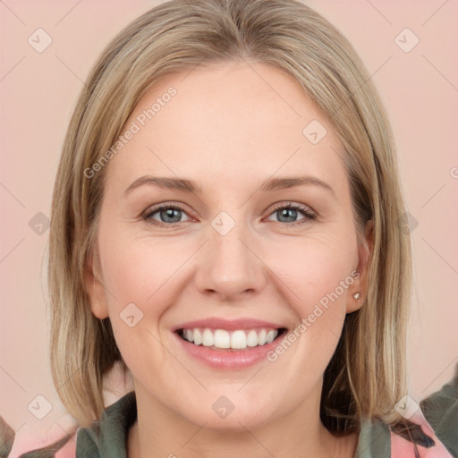 Joyful white young-adult female with medium  brown hair and green eyes