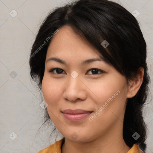 Joyful asian young-adult female with medium  brown hair and brown eyes