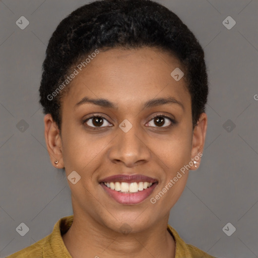 Joyful black young-adult female with short  brown hair and brown eyes