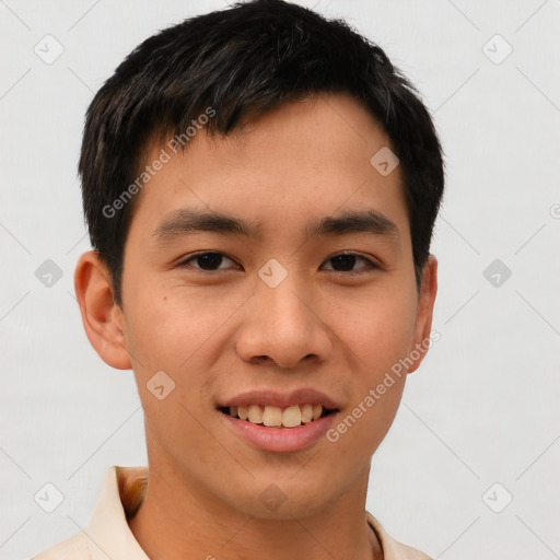 Joyful asian young-adult male with short  brown hair and brown eyes