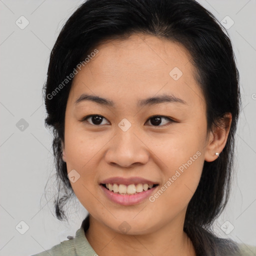 Joyful asian young-adult female with medium  black hair and brown eyes