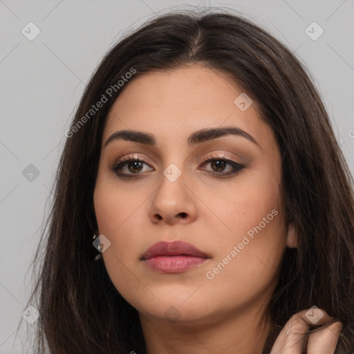 Neutral white young-adult female with long  brown hair and brown eyes