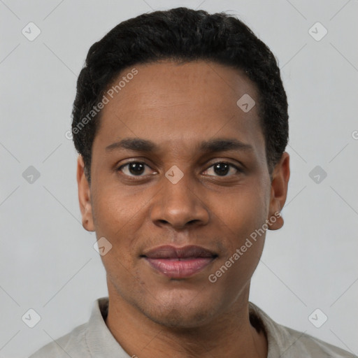 Joyful black young-adult male with short  black hair and brown eyes