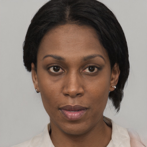 Neutral black young-adult female with short  black hair and brown eyes