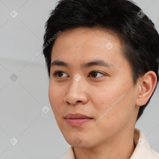 Neutral white young-adult male with short  black hair and brown eyes