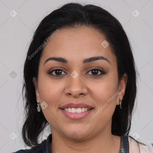 Joyful latino young-adult female with long  brown hair and brown eyes