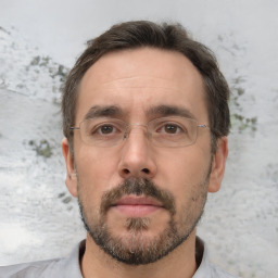 Neutral white adult male with short  brown hair and brown eyes