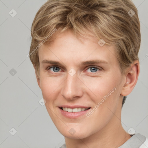 Joyful white young-adult female with short  brown hair and grey eyes