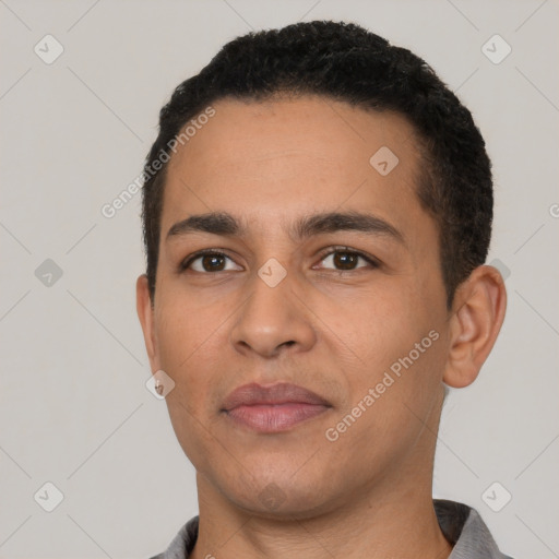 Neutral latino young-adult male with short  black hair and brown eyes