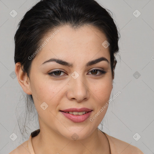 Joyful latino young-adult female with medium  brown hair and brown eyes