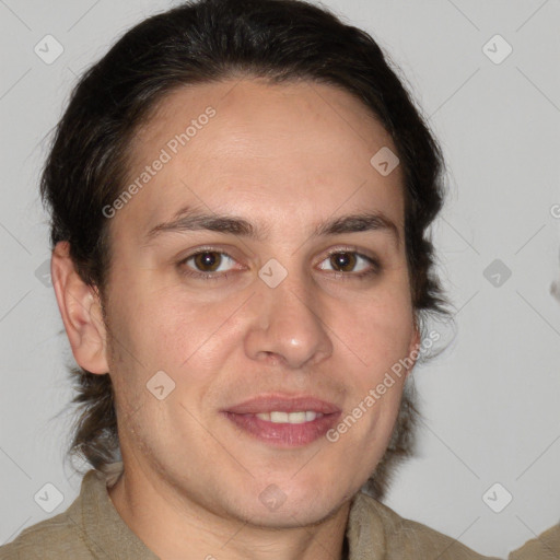 Joyful white adult male with medium  brown hair and brown eyes