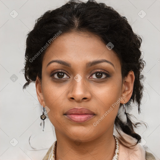 Joyful black young-adult female with long  brown hair and brown eyes