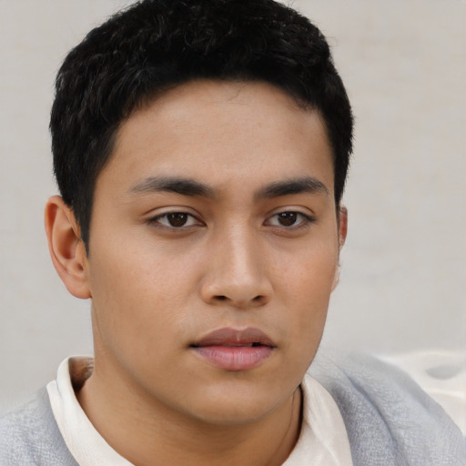 Neutral asian young-adult male with short  brown hair and brown eyes
