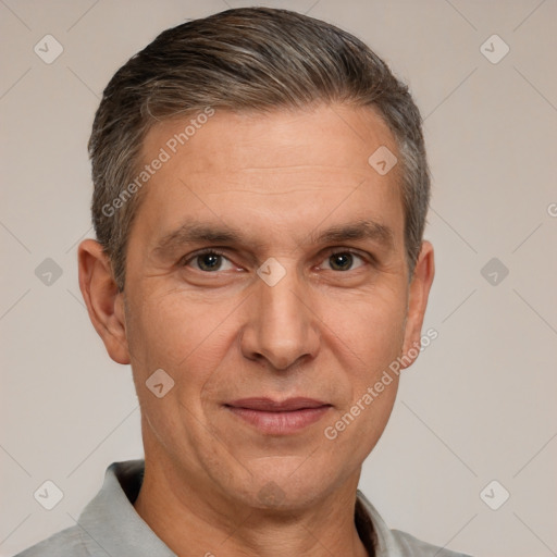 Joyful white adult male with short  brown hair and brown eyes