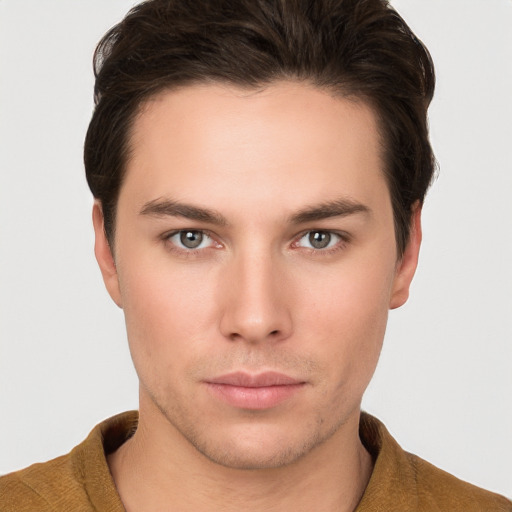 Neutral white young-adult male with short  brown hair and brown eyes