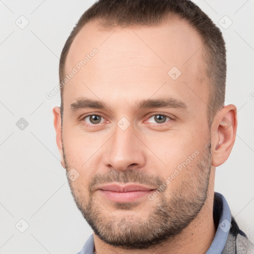 Neutral white young-adult male with short  brown hair and brown eyes