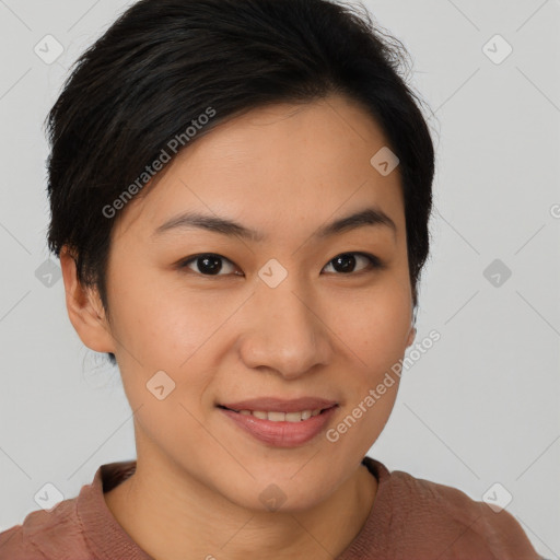 Joyful asian young-adult female with short  brown hair and brown eyes