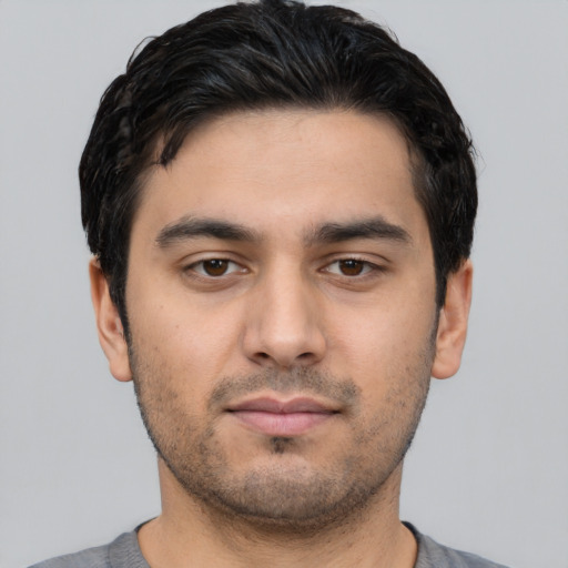 Neutral white young-adult male with short  black hair and brown eyes