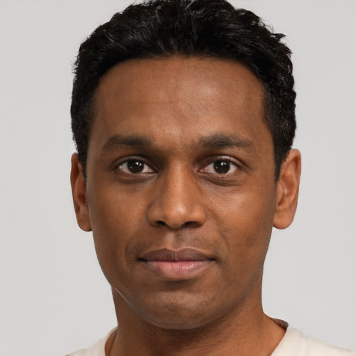 Neutral black young-adult male with short  black hair and brown eyes