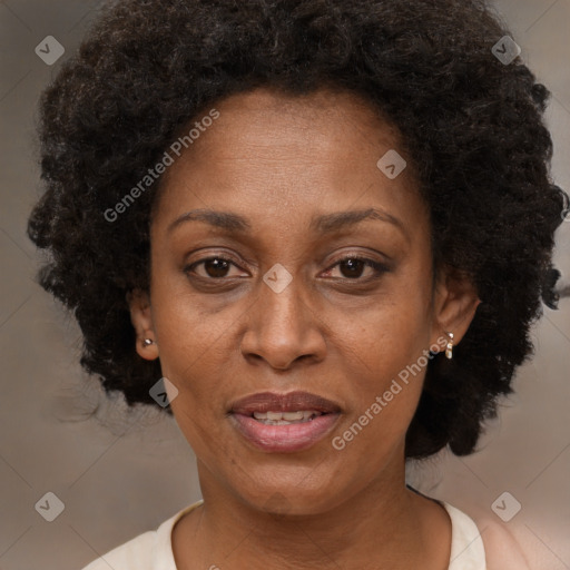 Joyful black adult female with short  brown hair and brown eyes