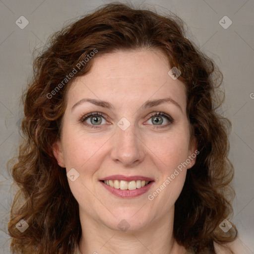 Joyful white young-adult female with medium  brown hair and green eyes