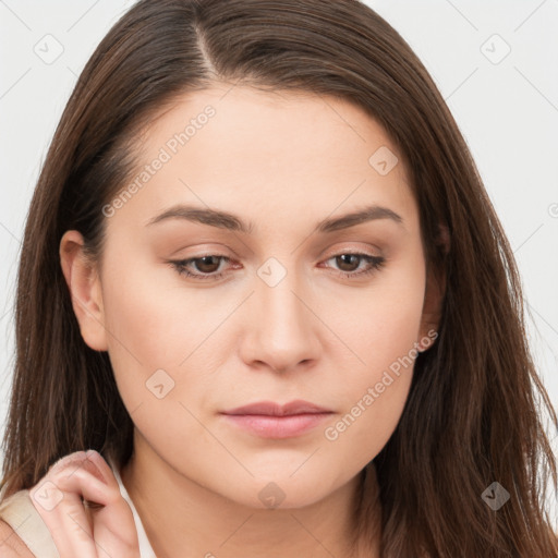 Neutral white young-adult female with long  brown hair and brown eyes