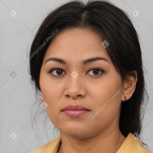 Joyful asian young-adult female with medium  brown hair and brown eyes