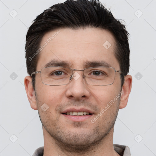 Joyful white adult male with short  brown hair and brown eyes