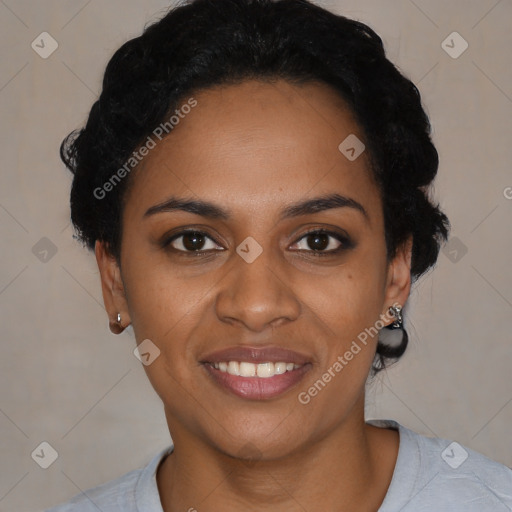 Joyful black young-adult female with short  black hair and brown eyes