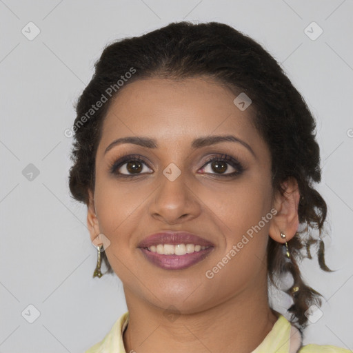 Joyful black young-adult female with medium  brown hair and brown eyes