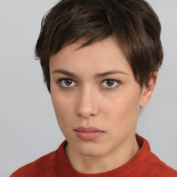 Neutral white young-adult female with short  brown hair and brown eyes