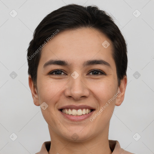 Joyful white young-adult female with short  brown hair and brown eyes