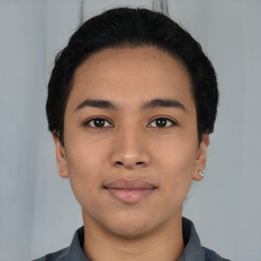 Neutral latino young-adult female with short  black hair and brown eyes