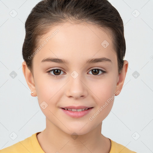 Joyful white child female with short  brown hair and brown eyes