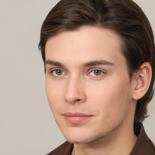 Neutral white young-adult male with medium  brown hair and brown eyes