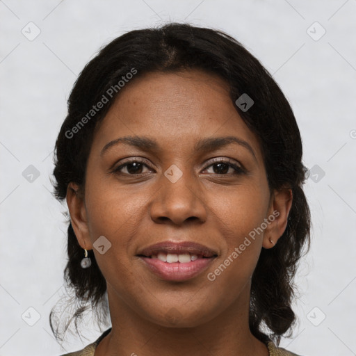 Joyful black young-adult female with medium  brown hair and brown eyes