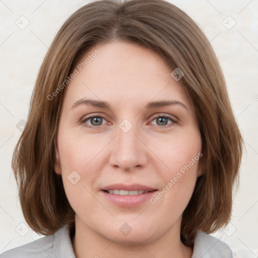 Joyful white young-adult female with medium  brown hair and green eyes