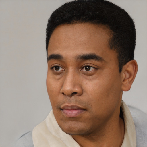 Neutral black young-adult male with short  black hair and brown eyes