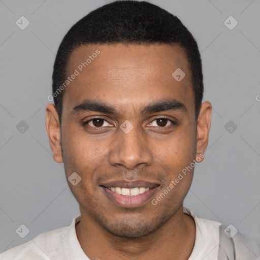 Joyful black young-adult male with short  black hair and brown eyes