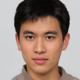 Neutral asian young-adult male with short  brown hair and brown eyes