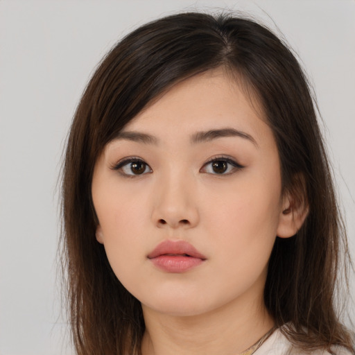 Neutral asian young-adult female with long  brown hair and brown eyes