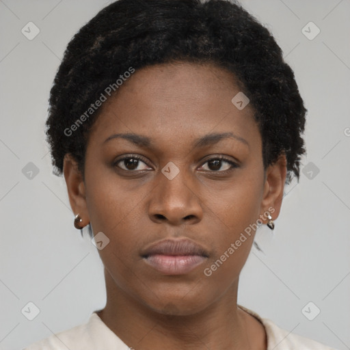 Neutral black young-adult female with short  brown hair and brown eyes