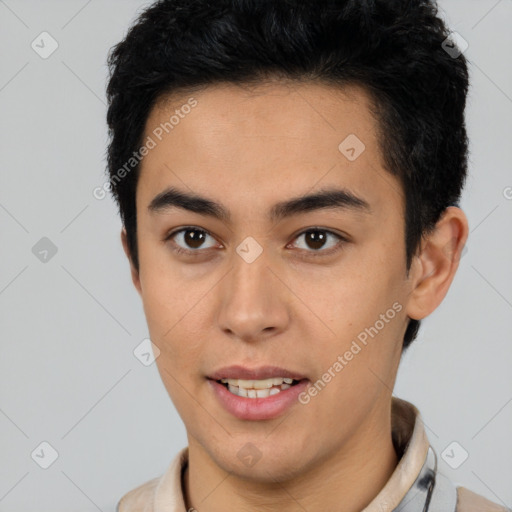 Joyful latino young-adult male with short  brown hair and brown eyes