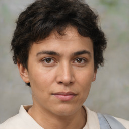 Neutral white young-adult female with short  brown hair and brown eyes
