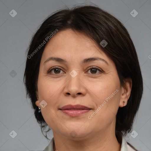 Joyful white adult female with medium  brown hair and brown eyes