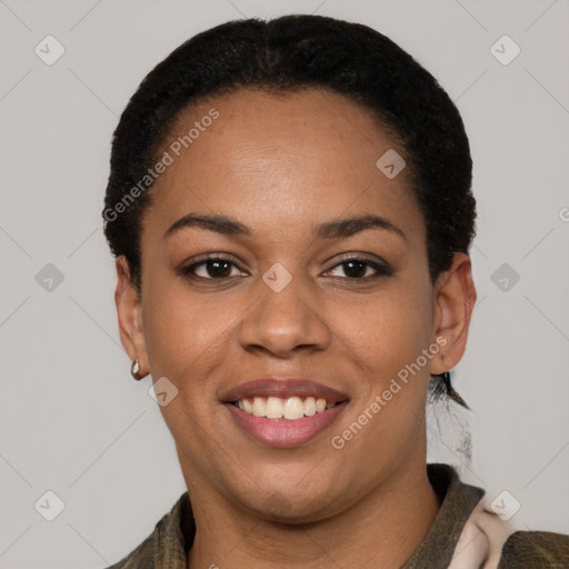 Joyful latino young-adult female with short  black hair and brown eyes