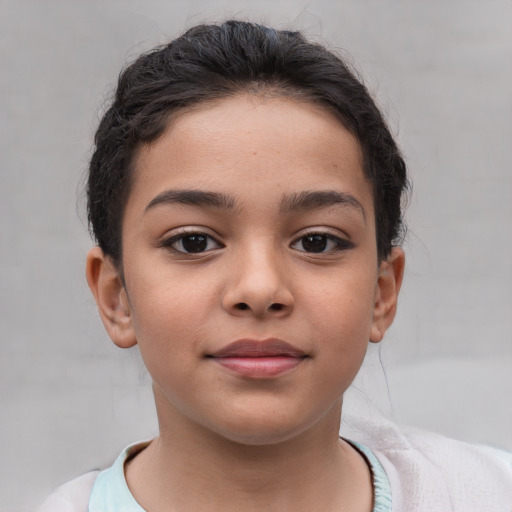 Joyful white child female with short  brown hair and brown eyes