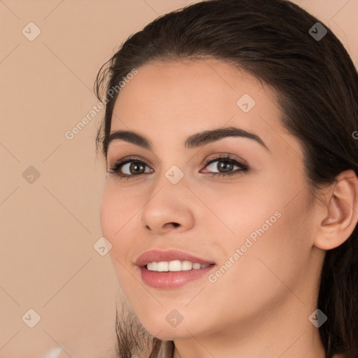 Joyful white young-adult female with long  brown hair and brown eyes